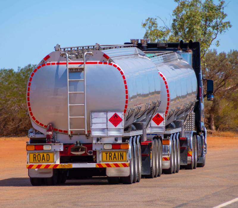 Back,Side,Of,An,Road,Train,Transporting,Gasoline,In,Australian Back,Side,Of,An,Road,Train,Transporting,Gasoline,In,Australian